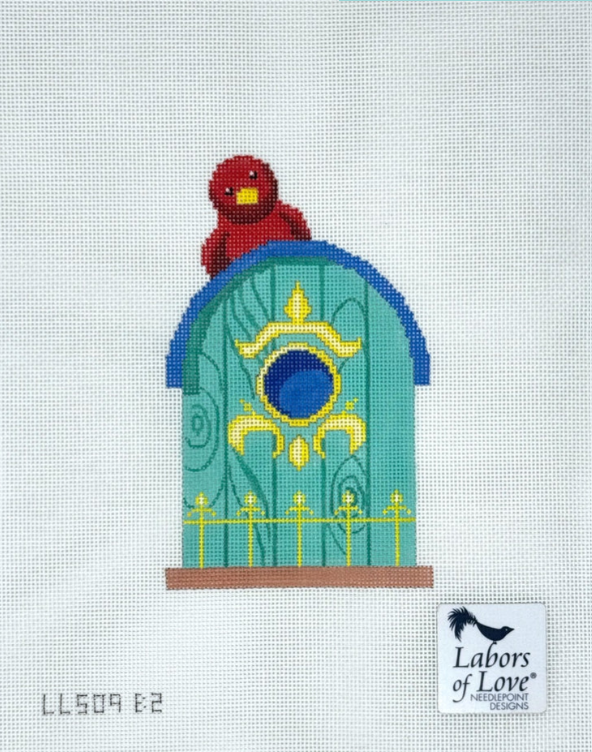 Turquoise Birdhouse with Red Bird