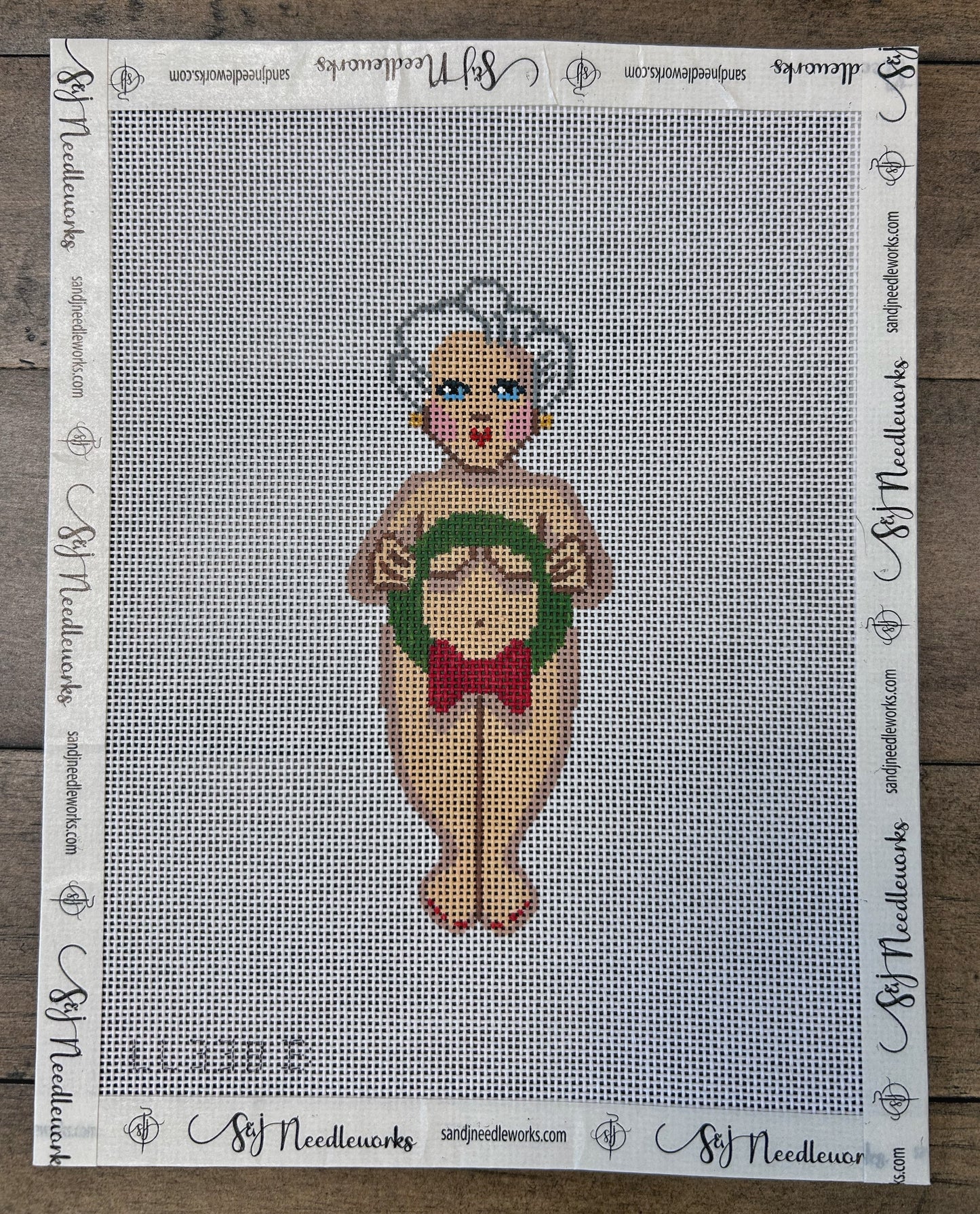 Naked Mrs. Santa with wreath