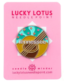 Round state needle minders