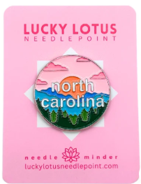 Round state needle minders